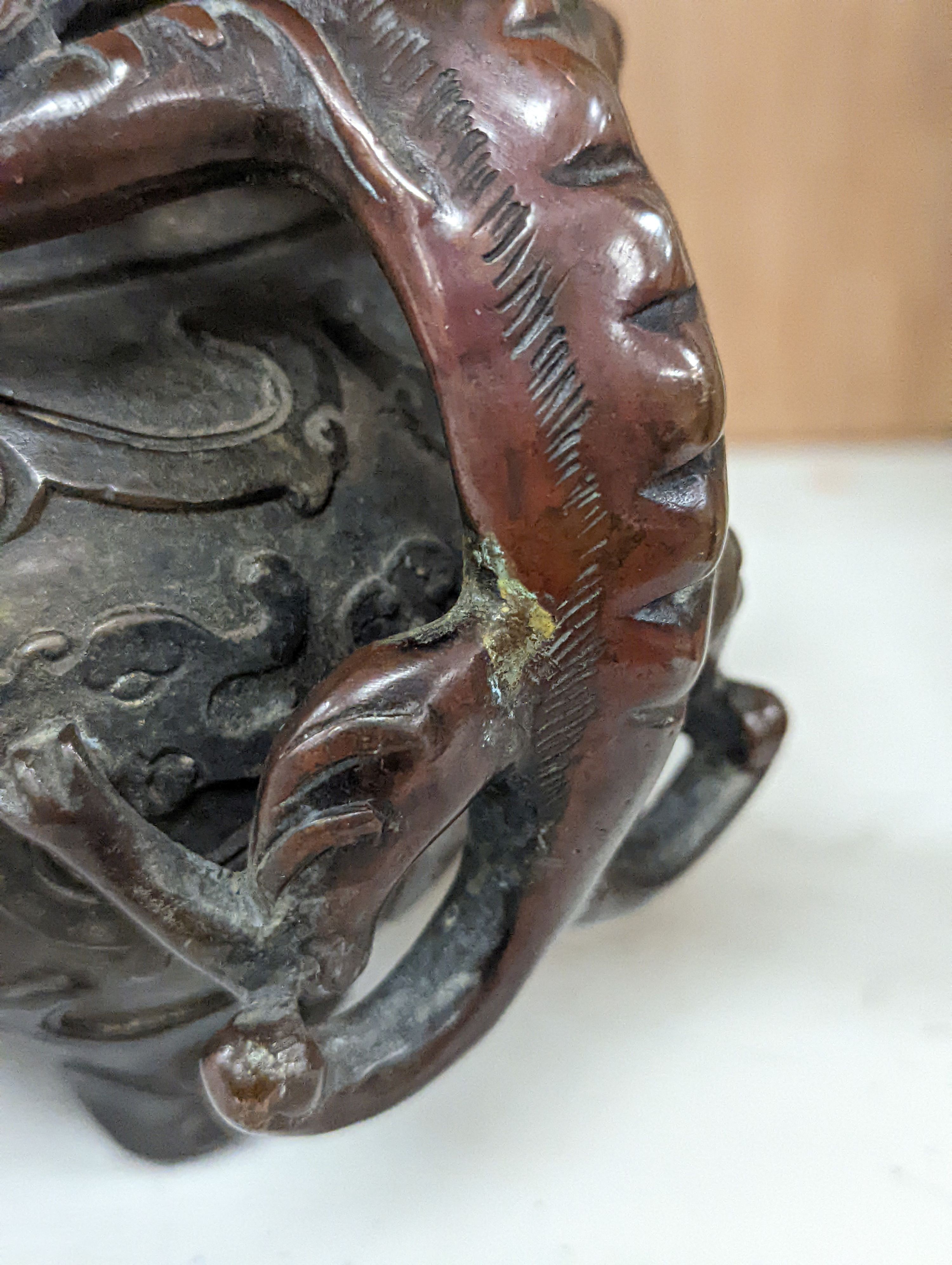 A 19th century Chinese bronze quatrefoil censer, with four character mark - 19cm high